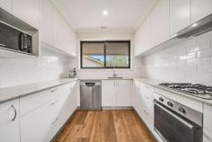 37 Birdwood Street Hughes ACT 2605 For living that's light and bright with plenty of room to move, you can't go past this double brick beauty. Beyond its distinctly retro façade, you'll find freshly schemed interiors that have been updated to reflect the needs and tastes of today's modern families. Spacious living and dining zones are complemented by a gorgeous contemporary kitchen, and four generously sized bedrooms. You'll feel completely indulged by each of the bathrooms, their stunning finishes worthy of a luxury hotel. Outdoors, the established gardens afford you perfect privacy and a tranquil sanctuary to enjoy, while still offering you the chance to create your own alfresco haven. Situated in a tightly held suburb, and showcasing breath taking views towards Black Mountain and Woden Valley, you'll also be in the sought-after catchment for both Hughes Primary School and Alfred Deakin High School. In addition, local shops and parks are all close by, and Woden Town Centre is within very easy reach. Property features include: Spacious lounge room flows through to the dining room Elevated views towards Black Mountain, Woden Valley Updated gas kitchen, subway splashback, dishwasher, and custom breakfast bar Covered outdoor area to the rear incorporates a built-in BBQ Four bedrooms with built-ins, the master adjoining an ensuite Stunning finishes adorn both the main bathroom and ensuite Timber look floors across the all the living areas Ducted gas heating throughout, reverse cycle a/c in the lounge room Lush lawn and established gardens frame the home Garage parking for two cars Block: 823sqm Living: 159sqm Rates: $5,875pa Land Tax: $10,367pa (Investors only) UV: $1,247,000 (2022) Close proximity to: Hughes Primary School Alfred Deakin High School Westfield Woden Public transport Federal Golf Course Red Hill Nature Reserve Canberra Hospital