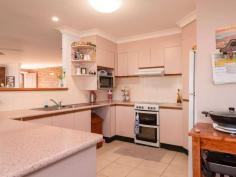 12 Waratah Way Goonellabah NSW 2480 $799,000 This large family home is set on a near level 889sqm allotment in the sought after Rosella Gardens Estate. Capturing the afternoon breezes and a lovely rural outlook, this low set, easy access home has enough space for the whole family. Boasting four generous-sized bedrooms all with built-ins, the main bedroom has an ensuite, while the main bathroom has been recently renovated. The home features a spacious open plan lounge/ dining area, the kitchen is centrally located and adjacent is the formal dining room. The large laundry extends out to a covered entertainment area which overlooks the well established gardens and solar panels ensure for low running costs. The double garage has extra work shop or storage space. This location is handy to the Workers Sports Club, playing fields and is centrally located between the Eastpoint and Goonellabah Shopping villages.