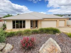 30 Brewer Dr West Wodonga VIC 3690 $820,000 Thoughtfully designed throughout and with enough room for the whole family, this beautifully presented home is sure to tick all your boxes. Situated in one of Wodonga’s most prestigious estates and offering over 24 squares of living, you’ll be impressed by this homes functionality, immaculate condition and substantial 1,220m2 allotment. Comprising of four large bedrooms, the master is complete with walk in robe and a generous ensuite. The remaining three bedrooms all receive plenty of natural light, have built in robes with a mirrored door and are serviced by the main bathroom that will cater for the whole family. Three living zones allow for everyone to relax in their own space with an open plan family, dining and kitchen arrangement, rumpus to the rear and kids activity room ideally located centrally to the bedrooms. The kitchen has been designed to be the hub of the home and boasts stone benchtops, an extensive island bench, plenty of storage options and stainless steel appliances including 900mm cooker, dishwasher and built in microwave. Flowing beautifully from the rumpus and living through stunning glass panel doors, two decked alfrescos allow you to wine and dine in comfort all year round whilst overlooking the sparkling spa and manicured grounds and gardens! With rear yard access available through the garage, the yard provides plenty of room for a shed or pool should you desire. Additional features include evaporative cooling and ducted heating, ceiling fans to all rooms, window furnishings throughout, feature plantation shutters and a three car garage with remote and internal access for your convenience. Surrounded by quality homes and leafy tree lined streets, this sort after location offers easy access to nearby parks and playgrounds, medical centres, schools, shopping and Wodonga Golf Course. We welcome your inspection and enquiry.
