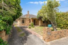 6 Bayside Grove Seaford VIC 3198 $785,000-$835,000 Situated just a short stroll to Seaford's beautiful sandy Beach this mid century classic, original home offers a rare opportunity to enter the beachside property market at a very attractive price. Set on a generous 560 sqm block in a quiet street this charming brick home features a versatile floor plan with two separate living areas or 3 bedrooms with robes, hardwood floors, 9 ft ceilings, ornate plaster, feature chimney fireplace, ducted heating, evap cooling, updated bathroom and large rear living area. Outside is a large garage and spacious lawn with established gardens and bungalow/ studio home office. With huge potential to renovate to your style and add value this is an amazing character home and ideal investment just a short walk to train station, cafes, parks, nature trails, easy fwy access and the beautiful beach. An amazing lifestyle awaits.