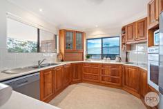 9 Whitbread Drive Lemon Tree Passage NSW 2319 This neatly presented double brick home, positioned on the high side of the street, takes in water views over Lemon Tree Passage. It stands out that this home has been loved the moment you walk in the door. The configuration has a bedroom, bathroom and living area with a kitchenette all on the lower level. While the upper level holds a further three generous bedrooms, all with built-in robes and a master with renovated en-suite. The sunlit open plan living and dining area are perfect for the family gatherings and the timber kitchen splays onto the balcony where the captivating views begin. When it comes to vehicle storage this one is hard to beat with an immaculate double garage with freshly finished epoxy flooring plus undercover side access to the backyard that holds two spacious sheds. It's only 850 meters to the waterfront marina, restaurants, cafes, specialty stores and boardwalks. Catch a glimpse of a koala or a dolphin swimming past while you enjoy this magnificent piece of paradise. Don't take my word for it come and see for yourself.