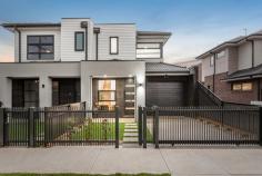 1/1 Clarendon Parade West Footscray VIC 3012 Sitting proudly on a beautiful tree-lined street, this brand new, luxury property is an unmissable opportunity. No expense has been spared in curating this high-end home featuring the creme de la creme of all fixtures and fittings. Natural light floods each space with large, high-quality, double-glazed windows throughout, and squareset, high ceilings make already generous spaces, feel even more grand. High-end European Oak hardwood floorboards (with a satin finish) guide you throughout the lower level of the home. Light-filled and airy, the generous, open plan living, and dining zone becomes the perfect area to entertain. From this space, large, double glazed, bi-fold doors open to the rear courtyard with merbau decking, making indoor/outdoor living effortless. The heart of the home, the kitchen, fuses luxury, style and functionality; featuring high-end stone benchtops, matte black finishes, under bench and cabinetry mood lighting, stone splashback, wide waterfall island bench, gas cooktop and an abundance of storage. Work from home with ease in the light-filled office space, overlooking the landscaped front courtyard and quiet, picturesque streetscape. Supreme Tasmanian oak hardwood stairs guide you to the upper level of the home where high quality loop carpet enhances each space. The grand master suite boasts generous proportions and is serviced by a large walk-in robe and a private, luxury ensuite. It is rare to find secondary bedrooms so large and light-filled with floor to ceiling, mirrored built-in robes. The two central bathrooms and master ensuite, feature floor to ceiling porcelain tiles, stone benches, stylish black finishes, custom frameless shower screens, vanity with storage, shower niches and a free-standing tub on the lower level. A large, separate laundry adorned in stone with an abundance of storage completes the home. Embrace the outdoors with large front and rear courtyards with low-maintenace, landscaped gardens and high-quality plants. Bordering Yarraville, located less than 10kms from the city, enjoy an abundance of amenities at your doorstep, including numerous schools, train stations, parklands, Yarraville Village, shops, cafes and restaurants. Additional features: – Lock-up remote-control garage – 2PAC custom made cabinetry in the kitchen, bathrooms and laundry – Built-in shelving and drawers in all wardrobes – High doorways throughout – Ducted heated and refrigerated cooling throughout – Security alarm and video intercom – Quality Dulux paint throughout – Exposed aggregate driveway