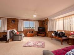 12 Waratah Way Goonellabah NSW 2480 $799,000 This large family home is set on a near level 889sqm allotment in the sought after Rosella Gardens Estate. Capturing the afternoon breezes and a lovely rural outlook, this low set, easy access home has enough space for the whole family. Boasting four generous-sized bedrooms all with built-ins, the main bedroom has an ensuite, while the main bathroom has been recently renovated. The home features a spacious open plan lounge/ dining area, the kitchen is centrally located and adjacent is the formal dining room. The large laundry extends out to a covered entertainment area which overlooks the well established gardens and solar panels ensure for low running costs. The double garage has extra work shop or storage space. This location is handy to the Workers Sports Club, playing fields and is centrally located between the Eastpoint and Goonellabah Shopping villages.