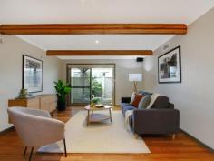 Unit 5/11 Howitt St The Avenue Kingston ACT 2604 $1,200,000 Situated in a highly regarded, quiet and private complex: "The Avenue" offers modern townhouse living in the heart of Kingston Village. Featuring quality updates throughout, this unique, Solar-efficient home has been fully renovated and presents as an ideal opportunity for the owner-occupier, downsizer or young family seeking access to blue-ribbon schools within the inner-south catchment area. With a highly functional floor plan, this townhouse features internal access from the remote-controlled garage into a full-sized Laundry, with adjacent powder room. There are also two separate living areas downstairs including a spacious dining room with adjacent Kitchen and separate lounge room with rear courtyard access. Energy efficiency is assured with quality double-glazed windows and additional insulation. Peace of mind for the security conscious is provided by Crim-safe window treatments. Unique to this home, there is an abundance of light from both the front and rear courtyards. Polished Tasmanian Blackbutt floor boards throughout are charmingly highlighted by exposed timber beams in the ceiling and the polished timber staircase. The living areas are serviced by reverse cycle heating and cooling providing year-round comfort. The well appointed kitchen overlooks the front courtyard and features plenty of cupboard space with an integrated Miele dishwasher, AEG brand induction cook top and built-in oven and microwave. Stone benchtops and contrasting splash backs accent the practicality of the Kitchen and a unique fold-out pantry complements the abundance of storage. There is also ample on-site visitor parking adjacent to the home and plenty of space to park a second car in front of your garage. The central staircase leads you to three well-proportioned bedrooms upstairs; each large enough for a Queen-sized bed. Due to this being an end-unit, the stairwell has the added advantage of a full length widow providing additional light throughout the home. The Master Bedroom has a walk-through robe providing access to the en-suite which includes a shower, toilet, custom-built vanity and in-slab heating. The 2nd and 3rd bedrooms also have built-in robes and there are internet and television connection points throughout the home. The master bedroom is segregated from the other two bedrooms by the family bathroom, which features new floor tiles, a custom-built vanity, shower, separate bath, large skylight and in-slab heating. In this fantastic location you will enjoy easy access to all amenities provided in the heart of Kingston, which is a mere five minute stroll away. You will be hard pressed to find anywhere else that can offer privacy, tranquility and an abundance of light-filled rooms and spacious living as you will find in this unique home. Features: North Facing, Three bedroom, two story townhouse Extensive fit-out of Solar Panels and back-to-grid inverter Polished Hardwood floors throughout Two separate living areas Fully renovated throughout with updated bathrooms, laundry, powder room and kitchen Two light filled courtyards Spacious Master with walk-through robe leading into an en-suite In-slab heating for both bathrooms Reverse cycle air conditioning ensures year-round comfort throughout the home Built in robes to all rooms Retractable awning over front courtyard Solar panels Additional car space and ample on-site visitor parking