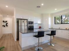 19 Cavendish Road Goonellabah NSW 2480 $1,095,000 You will come for the custom designed and built home and will be sure to stay for the breath taking views. At under 12 months old, this home presents as new and will take all of the time and hard work out of the process, all you have to do is sit back and enjoy the vistas, morning, noon and into the evening. A true family home - features include four bedrooms, two bathrooms, powder room, three car accommodation, high ceilings and ducted air conditioning throughout. The heart of the home without doubt is the spacious kitchen, dining and lounge room. With direct access to the backyard and the North facing front deck, this is the perfect place to take full advantage of the views to the ranges and beyond. Privately located at the end of a quiet street and set back from the road, your privacy is assured. Only minutes to all the amenities of Goonellabah, 10 minutes to the CBD of Lismore and the coast is an easy 25 minute drive.