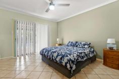 11 Bowerbird Loop Djugun WA 6725 $599,000 Positioned just five minutes' drive from both China Town & Cable Beach, and within easy walking proximity to Roebuck Primary School and beautiful Cygnet Park, this incredibly spacious three-bedroom home ticks a lot of boxes. A long concrete driveway with additional parking to the side, manicured front landscaping and a single covered carport are excellent introductions to the home and promote a welcoming street appeal. With two wrap-around verandas and extended eaves protecting the home from heat, respite is also offered in the form of a resort-style swimming pool in the backyard. Ceiling fans and split-system air conditioning also promote comfort throughout the abode. An open-plan design showcases the enormous living room, modern down lights and ceramic floor tiles. Large sliding windows invite natural light and cool evening breezes, with timber Venetian blinds ensuring privacy. Two 1200mm wide sliding glass doors are protected by security screens and lead out to a covered entertaining area which looks out across an in-ground swimming pool which is framed by lush palms and rock gardens. The entertainer's kitchen is characterised by a large L-shaped breakfast island boasting light-oak cabinetry and a contemporary 40mm speckled black stone counter top. Storage is abundant, and the main benches are framed by a sky-blue glass splashback. Avid home chefs will adore the 600mm integrated cooking appliances that are adorned by a partially-concealed gourmet rangehood. Three well-sized bedrooms enjoy ample built-in storage with the main bedroom showing off a sizeable walk-in robe and private ensuite. Both bathrooms in the home are well-appointed with contrasting ornate wall and floor tiles, opaque glass screens, generous vanity units and a tiled hob bathtub to the main for the kids. Adding to the convenience of the locale, a short drive will take you to the centre of Broome and all the popular amenities, such as shops, dining and cafe precincts.