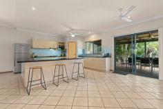 11 Bowerbird Loop Djugun WA 6725 $599,000 Positioned just five minutes' drive from both China Town & Cable Beach, and within easy walking proximity to Roebuck Primary School and beautiful Cygnet Park, this incredibly spacious three-bedroom home ticks a lot of boxes. A long concrete driveway with additional parking to the side, manicured front landscaping and a single covered carport are excellent introductions to the home and promote a welcoming street appeal. With two wrap-around verandas and extended eaves protecting the home from heat, respite is also offered in the form of a resort-style swimming pool in the backyard. Ceiling fans and split-system air conditioning also promote comfort throughout the abode. An open-plan design showcases the enormous living room, modern down lights and ceramic floor tiles. Large sliding windows invite natural light and cool evening breezes, with timber Venetian blinds ensuring privacy. Two 1200mm wide sliding glass doors are protected by security screens and lead out to a covered entertaining area which looks out across an in-ground swimming pool which is framed by lush palms and rock gardens. The entertainer's kitchen is characterised by a large L-shaped breakfast island boasting light-oak cabinetry and a contemporary 40mm speckled black stone counter top. Storage is abundant, and the main benches are framed by a sky-blue glass splashback. Avid home chefs will adore the 600mm integrated cooking appliances that are adorned by a partially-concealed gourmet rangehood. Three well-sized bedrooms enjoy ample built-in storage with the main bedroom showing off a sizeable walk-in robe and private ensuite. Both bathrooms in the home are well-appointed with contrasting ornate wall and floor tiles, opaque glass screens, generous vanity units and a tiled hob bathtub to the main for the kids. Adding to the convenience of the locale, a short drive will take you to the centre of Broome and all the popular amenities, such as shops, dining and cafe precincts.