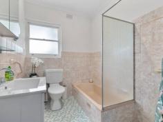 5/38a East Terrace KENSINGTON GARDENS SA 5068 This immaculate well presented two bedroom unit is ideally located on a tree lined street in the highly sought after suburb of Kensington Gardens. Set in a group of six and situated across from Kensington Gardens Reserve within easy walking distance of Pembroke School, St Peter’s Girls School and Norwood International High School, shopping centres, cafés, as well as fantastic transport links across Adelaide. Perfect entry into the property market as a first home or ideal investment opportunity. Upon entrance you are welcomed into the spacious cosy lounge room with timber floorboards, bay window, electric fireplace and split system air-conditioner, stepping through to the separate light and bright dining room and modern kitchen offering quality appliances including ceramic cooktop. The dedicated laundry leads to the large private paved courtyard where you can relax and enjoy a coffee. The garage with remote controlled roller door has access to rear of property. The master bedroom enjoys the outlook to front garden and features an abundant floor to ceiling built-in wardrobes. The second bedroom is also of a good size and the bathroom offers the convenience of a spacious shower, full sized bath, vanity and toilet. Key features include: • Lounge room with electric fireplace • Modern kitchen & dining room • Master bedroom with built-in robes • Good sized second bedroom • Bathroom with separate bath & shower • Dedicated laundry • Split system air-conditioning • Garage with remote access • Private paved courtyard