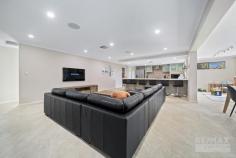 24 Enfield Turn Carramar WA 6031 This huge 5/6-bedroom, 2-bathroom property has so much space for the whole family! Located opposite Peter Turner Park & close to all local amenities this stunning home is guaranteed to impress! Features & benefits include: * Double door entry * Entrance hall with shoppers’ access from the garage * Study / home office / 6th bedroom * Family area * Kitchen with breakfast bar, feature bulk head, double fridge / freezer recess with cold water feed, 2 single drawer dishwashers & a large walk in pantry * Large dining area * Home theatre * Activity area with built in shelving * Master bedroom with large walk-in robe & ensuite with double shower, vanity & separate WC * 4 further spacious bedrooms with built in robes * Family bathroom * Well-appointed laundry with floor to ceiling, sliding door linen closet * 2nd WC * Ducted, reverse cycle air conditioning * Outdoor entertainment area * Generous grass area * Easy care gardens * Garden shed * Extensive liquid limestone driveway with plenty of parking * Double, remote garage * Large 641 sqm block * Close to schools, shops, The Carramar Golf Course, transport & all other local amenities.