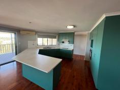 11 Reliance Court Clinton QLD 4680 $450,000 This home sits at the top of the hill in a quiet cul de sac on a massive 1419m2 looking over the Gladstone horizon. Close enough to Kin Kora shopping centre and the Bunnings/ Harvey Norman precinct, plus local schools nearby. * External stairs leads to the top living areas of the home * Large open plan living with timber floors throughout the bedrooms and main living areas * Kitchen has a glass cook top, electric oven, ample bench space, double sink, a/c, ceiling fan * A breakfast bar will be ideal for those casual meals * Plenty of space for the large dining setting and lounge area * Main bedroom, with ensuite, a/c, ceiling fan, walk in robe * 3 bedrooms 1 with a/c, ceiling fan, robe, 2 with ceiling fan, robe * Main bathroom has a bath, and separate shower plus separate toilet * Broom Cupboard plus plenty of storage cupboards * Double doors lead out to the wrap around verandah on one side overlooking the natural bushland of this block * Double Garage for parking * Elevated back yard with gate access to bushland behind