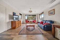 37 Birdwood Street Hughes ACT 2605 For living that's light and bright with plenty of room to move, you can't go past this double brick beauty. Beyond its distinctly retro façade, you'll find freshly schemed interiors that have been updated to reflect the needs and tastes of today's modern families. Spacious living and dining zones are complemented by a gorgeous contemporary kitchen, and four generously sized bedrooms. You'll feel completely indulged by each of the bathrooms, their stunning finishes worthy of a luxury hotel. Outdoors, the established gardens afford you perfect privacy and a tranquil sanctuary to enjoy, while still offering you the chance to create your own alfresco haven. Situated in a tightly held suburb, and showcasing breath taking views towards Black Mountain and Woden Valley, you'll also be in the sought-after catchment for both Hughes Primary School and Alfred Deakin High School. In addition, local shops and parks are all close by, and Woden Town Centre is within very easy reach. Property features include: Spacious lounge room flows through to the dining room Elevated views towards Black Mountain, Woden Valley Updated gas kitchen, subway splashback, dishwasher, and custom breakfast bar Covered outdoor area to the rear incorporates a built-in BBQ Four bedrooms with built-ins, the master adjoining an ensuite Stunning finishes adorn both the main bathroom and ensuite Timber look floors across the all the living areas Ducted gas heating throughout, reverse cycle a/c in the lounge room Lush lawn and established gardens frame the home Garage parking for two cars Block: 823sqm Living: 159sqm Rates: $5,875pa Land Tax: $10,367pa (Investors only) UV: $1,247,000 (2022) Close proximity to: Hughes Primary School Alfred Deakin High School Westfield Woden Public transport Federal Golf Course Red Hill Nature Reserve Canberra Hospital