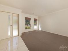 14 Burton Cres Wodonga VIC 3690 $669,000 Located in the ever popular White Box Rise Estate, enjoy a peaceful outlook over the reserve right from the front doorstep. Boasting a practical and well thought out floorplan along with a selection of tasteful tones and finishes, this home offers a low maintenance lifestyle in a convenient location. - The private master suite is positioned to the front of the home with beautiful feature doors on arrival, generous walk-in robe and en-suite, - A further three bedrooms all with built-in-robes with mirrored doors and are serviced by the main bathroom, - Two living options are available for your convenience, a separate formal lounge to the front of the home with parkland views or the open plan kitchen, dining and family area, -The kitchen boasts an island bench for informal dining, modern stainless steel appliances including dishwasher and 900mm freestanding cooker and an oversized walk-in pantry, - Sliding doors from the open plan living arrangement provide access to the extensive covered outdoor alfresco making for blissful entertaining, - The rear yard is fully secure with low maintenance manicured grounds and gardens, - The heating and cooling are well taken care of with evaporative cooling and ducted gas heating, - The garage offers both remote and direct internal access to the pantry, - Additional features include window furnishings throughout, full laundry with access outdoors and terrific storage options, - Expected rental return of $450 - $490 per week. The proximity of this home to great facilities including children's playgrounds, open parklands, popular primary schools, childcare centres, Waves swimming pool and White Box Rise shopping complex will be favorable to many.