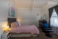 24 Day St Henty NSW 2658 $235,000 Tidy two bedroom home set on a huge 1012sqm block with rear lane access, and opportunity to develop further. The miner's cottage styled home features the traditional central hallway, Murray pine timber flooring, which opens up to a large open kitchen meals & family room. This also extends to a covered outdoor alfresco, entertainment space to enjoy that large block. The kitchen has been tastefully updated and includes an enormous amount of preparation benches, cupboards, an electric cooktop and under bench oven. The open planned living room offers a wood fire and a reverse cycle split system air conditioner. The 2 generous sized bedrooms are service by a bathroom and then there is a separate laundry & toilet. With front and rear access, the property includes a double carport and as mentioned, a block plenty large enough for a second dwelling, or any amount of shedding if required. Centrally located within the township, you can walk down the road and have a swim at the local pool, there's plenty of shopping facilities and I hardly miss the opportunity to call in to the local bakery for a coffee & where you can enjoy some beautiful treats or a wonderful lunch.