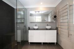 1 Bronwyn Place Bowral NSW 2576 $1,395,000 If you are looking for a home that is fully and recently renovated with premium finishes and fixtures, close to the conveniences of the Bowral high street, moments from walking paths and on public transport routes, then you must stop looking - you will be suitably impressed with the beautiful residence. Please let us show you through! Zoned and ducted reverse-cycle air conditioning Plantation shutters throughout Engineered oak floors and carpeted bedrooms, living and study Open-plan kitchen, dining and family rooms Study with storage Chef’s kitchen that includes; Stone bench tops Two Bosch wall ovens Gas hobs Two pantries Under-cabinet lighting Soft-close joinery Bedrooms with built-in robing Main bedroom with walk-in robing and ensuite Bathrooms with heated towel rails and stone bench tops (main with a bath) Landscaped gardens with terracing and paving Double garage with electric doors and internal access Corner block Garden shed
