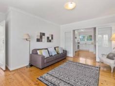 5/38a East Terrace KENSINGTON GARDENS SA 5068 This immaculate well presented two bedroom unit is ideally located on a tree lined street in the highly sought after suburb of Kensington Gardens. Set in a group of six and situated across from Kensington Gardens Reserve within easy walking distance of Pembroke School, St Peter’s Girls School and Norwood International High School, shopping centres, cafés, as well as fantastic transport links across Adelaide. Perfect entry into the property market as a first home or ideal investment opportunity. Upon entrance you are welcomed into the spacious cosy lounge room with timber floorboards, bay window, electric fireplace and split system air-conditioner, stepping through to the separate light and bright dining room and modern kitchen offering quality appliances including ceramic cooktop. The dedicated laundry leads to the large private paved courtyard where you can relax and enjoy a coffee. The garage with remote controlled roller door has access to rear of property. The master bedroom enjoys the outlook to front garden and features an abundant floor to ceiling built-in wardrobes. The second bedroom is also of a good size and the bathroom offers the convenience of a spacious shower, full sized bath, vanity and toilet. Key features include: • Lounge room with electric fireplace • Modern kitchen & dining room • Master bedroom with built-in robes • Good sized second bedroom • Bathroom with separate bath & shower • Dedicated laundry • Split system air-conditioning • Garage with remote access • Private paved courtyard