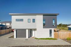 1/11 Melner Place Oakdowns TAS 7019 This superbly built home finished in 2021 is one of two residences on the block. with sweeping water views across the Derwent river to free flowing living that sets the benchmark for today's demand of what buyers are ultimately looking for. The lower level of the home consists of Garage, Laundry, two bedrooms and also large modern bathroom. The second level is where you find the master bedroom with large executive walk-in robe and luxury ensuite which is picture perfect. If your one for entertaining then this home is exactly what your are after with a large deck space off the kitchen and dining area that can be opened up to create the perfect indoor/outdoor space for cocktail parties, birthday's and even Christmas dinners. The yard is fully fenced and perfect if you have a fur family or just space for the children to play safely, Conveniently located and close by to the newly opened Glebe Hill Village shopping centre, Melner place is the place to be. Welcome Home