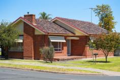 502 Parnall St Lavington NSW 2641 Looking for a solid investment? This double brick home certainly has the potential to move straight in and enjoy, or subdivide, build additional units (STCA) or lease out and acquire a land bank for the future. The block is reasonably level, with dual road access, a double length carport/pergola entertainment area plus the 2 sheds down the rear of the block. One a good brick workshop with an additional carport, the other a double lockup garage with doors. The home has been in the family for many years and well maintained. consisting 3 bedrooms all with built-in robes, a formal lounge, gas heater with an updated ducted reverse cycle air conditioner throughout the home. The kitchen was updated and in good condition, offering electric appliances, floated timber flooring and adjacent meals area. The main bathroom, also renovated includes a toilet, then there is a second outside which would be very convenient. The laundry is under the same roof, accessed from under the huge covered area outdoors too. Not to stop there, the home also benefits from a newly installed hot water system. An ideal position for a family with younger kids, with 2 schools toward the both ends of the street, plus a high school not too far either. There are parks close by, or an easy walk to the shops.