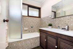 26 Kinsale Street Seaford VIC 3198 $700,000 - $770,000 Supremely positioned to enjoy a leafy street setting, this immaculately presented single level brick veneer home offers everything you need for easy family living! Inside you'll find a light-filled and welcoming layout with stunning timber-look flooring and large windows that allow an abundance of natural light to filter through. The light and bright kitchen offers wonderful functionality to suit all of your cooking needs. Serviced by gas cooktop and oven, dishwasher and plenty of cupboard storage, this zone flows onto a family dining area, through to a spacious, street facing living room. With three good size bedrooms, the master offers walk-in robe and ensuite, whilst the second and third bedrooms provide built-in robes. A tantalising opportunity to start out, size down or kick start an investment portfolio in a high-demand residential precinct, this home is serviced by wall furnace heating and evaporative cooling, offering year-round comfort. A pergola area out the back provides a space to bask in sunlight, whilst watching the kids play in the spacious backyard. Situated in an envious location, within close proximity to Belvedere Reserve and Seaford Park Primary School; public transport, education and local retail bolsters a family-friendly lifestyle. Positioned to enjoy easy access to both Seaford and Carrum Downs' coastal and retail destinations, with an easy commute into Melbourne' CBD via Eastlink.