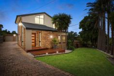27 Blaxland Avenue Frankston South VIC 3199 $1,050,000 - $1,150,000 Offering an enviable lifestyle within the Frankston High and Overport Primary school zones and in close proximity to Frankston Hospital, Monash University, cafes, Frankston Beach and with Sweetwater Creek Nature Reserve walking trails in walking distance, this family entertainer ticks all the boxes. Set behind electric gates, the elevated home is sure to impress with a neutral colour palette, vaulted ceilings, freshly painted throughout and lush green views providing a relaxed, tropical ambience. An open design flows directly out to the undercover alfresco area, offering the ultimate resort style entertaining space overlooking the solar heated pool area. The first level features a free flowing open plan living with as-new soft grey carpeting and ceiling fan, split system air conditioning and bar. The kitchen is complete with a breakfast bar and brand new appliances including a Bosch dishwasher, Westinghouse double oven and 900mm gas cooktop leading to the dining area with double sliding doors that open out directly to the large undercover decking area. Heading down the hallway, two bedrooms with built-in robes are serviced by the full family bathroom with shower, bath and separate toilet along with a separate powder room for additional convenience. Upstairs you will find the parents retreat or second living with floor to ceiling windows showcasing gorgeous sunset views. The spacious master bedroom hosts ensuite complete with a double shower, walk in robe and split system for added comfort. Extra flexibilities are provided with a fourth bedroom featuring a split system, tranquil views of Sweetwater Creek and access to the roof space for additional home storage. With a double garage and workshop space as well as ample space for the boat or caravan, this light-filled home also includes gas ducted heating, new colourbond roof and custom made plantation shutters.