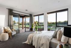 39 Hafey Way Langwarrin VIC 3910 $1,950,000 - $2,145,000 Envisioned with an eye for perfection, no expense has been spared on this recently completed statement of family luxury. Enjoying walking distance to Woodlands Primary School, where the promise of preservation ensures a lifetime of luscious outlooks without compromising accessibility to the Westernport Highway, Peninsula and East Link. Curated for an idyllic family experience, a private position at the end of the court reveals a generous sense of space from the onset, with an oversized triple garage and dramatic entryway to the residence. Welcomed into the entertainment domain, an immediate attention to detail highlights stunning finishes across soaring ceilings and seamless integration of window walls. Ziptrack blinds and a position within the roofline allow alfresco dining and making use of the cornerless stacking slider openings, to effortlessly extend the internal family zone. Confirming the home's capacity to host friends and family, a 4.5m long stone-topped island bench takes the kitchen's centre stage offering space to convene whilst meals are prepared. Delivering 3 premium ovens including steam, 900mm rotisserie, and an integrated microwave combination in addition with copious other premium inclusions such as an induction cooktop, integrated appliances, 1200mm fridge cavity and a spacious butler's pantry, all entertainment needs are well catered for. A spacious home theatre complementing the living areas, allows wide screen projection and surround sound which is complete with an ensuite and the potential to transform into guest accommodation. A third living space allows space for children to play embraced by three robed bedrooms and a central bathroom sharing a walk-in shower and bathtub. Balanced at the eastern end of the home the master bedroom rests within a parent's retreat boasting additional alfresco space for that quiet morning beverage enjoyed whilst watching the sun rise over the tops of the dense native bushland behind the property. Rounding out the master wing, is a private retreat or home office, gas-log fireplace, walk-in wardrobe and a double shower in the sumptuous ensuite. Bolstering the 4,772sqm (approx.) allotment, an array of established fruit trees provide summer sweetness for wandering feet complemented by an endless list of additional luxury appointments including: • Zoned climate control, • 4k security cameras, • 15kW solar system, • Ample off-street parking, • Massive garage/workshop with 3 phase power including a 20A outlet to the garage, • In-wall sound deadening to bedrooms and theatre, • Hide-a-hose retractable ducted vacuum system and kickers in the kitchen and butler's pantry, • Double glazed windows, • Instant gas hot water, • Soft-close cabinetry