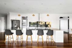 39 Hafey Way Langwarrin VIC 3910 $1,950,000 - $2,145,000 Envisioned with an eye for perfection, no expense has been spared on this recently completed statement of family luxury. Enjoying walking distance to Woodlands Primary School, where the promise of preservation ensures a lifetime of luscious outlooks without compromising accessibility to the Westernport Highway, Peninsula and East Link. Curated for an idyllic family experience, a private position at the end of the court reveals a generous sense of space from the onset, with an oversized triple garage and dramatic entryway to the residence. Welcomed into the entertainment domain, an immediate attention to detail highlights stunning finishes across soaring ceilings and seamless integration of window walls. Ziptrack blinds and a position within the roofline allow alfresco dining and making use of the cornerless stacking slider openings, to effortlessly extend the internal family zone. Confirming the home's capacity to host friends and family, a 4.5m long stone-topped island bench takes the kitchen's centre stage offering space to convene whilst meals are prepared. Delivering 3 premium ovens including steam, 900mm rotisserie, and an integrated microwave combination in addition with copious other premium inclusions such as an induction cooktop, integrated appliances, 1200mm fridge cavity and a spacious butler's pantry, all entertainment needs are well catered for. A spacious home theatre complementing the living areas, allows wide screen projection and surround sound which is complete with an ensuite and the potential to transform into guest accommodation. A third living space allows space for children to play embraced by three robed bedrooms and a central bathroom sharing a walk-in shower and bathtub. Balanced at the eastern end of the home the master bedroom rests within a parent's retreat boasting additional alfresco space for that quiet morning beverage enjoyed whilst watching the sun rise over the tops of the dense native bushland behind the property. Rounding out the master wing, is a private retreat or home office, gas-log fireplace, walk-in wardrobe and a double shower in the sumptuous ensuite. Bolstering the 4,772sqm (approx.) allotment, an array of established fruit trees provide summer sweetness for wandering feet complemented by an endless list of additional luxury appointments including: • Zoned climate control, • 4k security cameras, • 15kW solar system, • Ample off-street parking, • Massive garage/workshop with 3 phase power including a 20A outlet to the garage, • In-wall sound deadening to bedrooms and theatre, • Hide-a-hose retractable ducted vacuum system and kickers in the kitchen and butler's pantry, • Double glazed windows, • Instant gas hot water, • Soft-close cabinetry