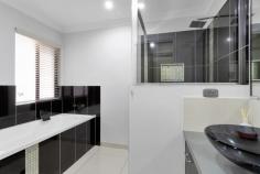 60 GINGHAM STREET GLENELLA QLD 4740 $749,000 Come home to Glenella each day & enjoy a short commute, a location that speaks of superior homes & a family-friendly neighbourhood! Enjoy an executive lifestyle in this modern family home situated on a large corner block in the delightful Northview Gardens Estate in Glenella. This location places you conveniently close to numerous schools, recreational parks, walking/cycling tracks, and shopping facilities, including Bunnings and Northpoint Retail, and only a short drive from major Medical Suites. The large corner block allows entry from two street access points & introduces low-maintenance front gardens, electric gates & a neatly maintained front lawn that leads to an impressive front entrance. From its unique and striking exterior colour palette to the modern, contemporary interior design, this home certainly makes a contemporary statement. The interior design includes a fully tiled, open-plan kitchen/dining/lounge area with a floating island bench for the most social of dinner parties! The brand new ducted reverse cycle air-conditioning maintains a comfortable temperature all year round & supports entertaining out onto the semi-enclosed patio with private pull-down awnings. This alfresco opportunity overlooks an exceptionally populated garden area, thriving with abundant plants, herbs & fruit trees - serve dinner directly from the garden! The entire home has been designed around the sociable entertaining area, which is the central hub, with bedrooms & garages on either side. The well-appointed & efficiently designed kitchen ensures that you are within three steps of the fridge, sink & cooking areas whilst also overlooking the entertaining area, plus utilizing the adjacent large island bench for an extra eating/preparation area with extra storage. The kitchen boasts generously sized cabinets and drawers for storage and a variety of appliances, including a 5-burner gas cooktop, electric oven, and new dishwasher. Left of the central living space is the luxurious master bedroom, featuring its walk-through mirrored wardrobe and oversized ensuite - the entire Master Suite is large, luxurious & private. Bedroom Two is a generously sized queen bedroom complete with sliding glass mirrored built-in robes, tv points & plantation shutters. This end of the house also contains one of the home's two double garages, complete with a concreted driveway. This double garage was once used as a home office & is still equipped with split system air-conditioning, fan & built-in wardrobes. If desiring to repurpose it again, this space could easily convert into an office, rumpus, or very comfortable workshop area. Leading from the right of the main living area, at the opposite end of the home, is the second of the double remote panel lift garage with concreted street entry; the generously sized laundry with good bench space & external access; the family bathroom with stunning black tiled plunge bath & separate shower; separate toilet; Bedrooms Three & Four that are carpeted, built-in, air-conditioned with ceiling fans & plantation shutters. Feel safe & secure in this excellent location, surrounded by high calibre homes, family-friendly neighbours, and fully fenced property with Crimsafe securities & registered keys, all in the quiet, safe suburb of Glenella. Ideal for a growing family, 60 Gingham Street could be the home you've been waiting and hoping for, so don't hesitate to contact Robyn to arrange your inspection. What We Love About Glenella: Safe, Quiet, and Family-friendly: - Easy access to Bruce Highway, Mackay Bucasia Rd, and Mackay Ring Road - Great choice of schools - Beautiful parks for exercise and recreation - Variety of shopping locations