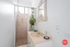 11 Skye Close Boambee NSW 2450 $799,000 - $840,000 Wanting to simplify life in a quiet natural paradise, yet stay conveniently close to everything? In Middle Boambee Valley at the end of a quiet Cul de Sac, sits this renovated cozy home with infinite potential to expand. Live the carefree life on this flood free parcel of land, with approximately one third of the property completely level, and the balance planted out with fruit & nut producing trees, and space to build a second dwelling. Yet only minutes away, you can find all the convenience of schools, playing fields, shops and a swim school. Then not too much further you can find the picturesque headlands and pristine beaches of the Sawtell coastline. The perfect property for downsizers, those just starting out, young families and nature lovers. It presents the ideal acre of great growing soil with a cosy brick and tile two bedroom cottage with dwelling permissibility approval for a second dwelling or granny flat. Set well back off the road for privacy, this property provides the perfect opportunity to secure a home in this very desirable location at an affordable price! As you enter this property you are greeted by nature, with rainforest and native trees flanking the driveway, resetting you into a state of relaxation. The entrance to the home is through an avenue of tree ferns and antique etched French doors. The light filled living room incorporates kitchen, dining and lounge with nooks looking out into the ferns and forest. The large main bedroom with robes contains extra spaciousness for a home office and features a view of an ancient fig tree from the window. The second bedroom, with robes prefect for kids, has mountain and orchard views. The bathroom / laundry of this home is ready for its next level of renovation. Outside the back door is a level area with plenty of room for kids to run, play and jump on trampolines, and then an enclosed veggie garden makes for the ideal mini farm - with plenty of room to expand. It offers an abundance of space for the kids to run and play on the level backyard, explore the mango and maccadamia orchard covered hill and surrounding wilderness that is full of surprises. A pathway then leads one to a creek, dams and orchards. A natural spring fed stream on the property provides water which can be used for irrigation. The picturesque creek running through the back of the property is a haven for wildlife and real connection with wilderness. Mature Turpentine and Brush box are a feature. There are sweet spots at vantage points on the acreage where you can enjoy a warm cuppa on a garden bench as you watch the sunset or listen to the dawn birdsong. This secluded little piece of paradise will be a peaceful and quiet haven away from the rest of the world. If you crave a simpler lifestyle, this is the place for you. All this under 8 km to the pristine beaches, delightful cafés and restaurant culture of Sawtell, with schools, entertainment, airport & hospital all conveniently close. Don't delay viewing, as opportunities like this rarely present themselves in this enviable location.