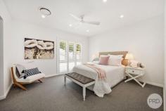 24 Mulubinda Parade Corlette NSW 2315 $2,950,000 - $3,245,000 This majestic, master-built residence located in one of Port Stephens most sought-after locations combines spectacular panoramic water views over Port Stephens with an outstanding interior design. Solid in its suspended concrete construction and superbly crafted in an elevated north facing position, this residence comprises of four bedrooms of accommodation, three bathrooms, various living areas and captures stunning 180-degree views from multiple levels and areas throughout the home. The open plan layout melts the kitchen area with grand living and dining spaces in a light filled ambience with blue vistas through a premium panoramic window front and sky lights. Exclusivity and quality at the highest level wherever you look. A high end kitchen built by the award winning team at Latham Kitchen designs comes equipped with a one-piece stone bench top, automated cupboard doors, SMEG appliances like induction cook top, dual ovens, and plate warmer as well as a built-in coffee machine. Kitchen cupboards are fitted with internal drawers for easy access and organised storage. You'll also find an adjoining Butler's Pantry with integrated fridge and further preparation space for the Master Chef's or entertainer. Nothing has been missed when it comes to this premium gourmet design. The bathrooms come with exceptional comfort and style. Designed with care and thought, they include underfloor heating, heated towel rails, generous shower recess complete with niche and linear drains, an elegant free-standing bathtub, and are tiled floor to ceiling with feature walls and floating vanities. When it comes to outdoor living, spend the summer entertaining on the balcony or on the terrace where you overlook the swimming pool and take in the panorama across this magnificent waterway. These views are unbeatable, and you are only 580m from the water's edge. Indoor comfort is also taken care of with solar hot water, ducted air conditioning, an open fireplace and sea breezes. The layout of the residence allows for separate living on the lower level, if so desired, and comes complete with bedroom, bathroom, kitchenette and living area. This space can be accessed internally or made private with external access. Perfect as a retreat or an additional income earner. Dual street frontage provides additional access via the cul-de-sac of Myan Close to the off-street parking spaces as well as the spacious double garage, workshop, and storage area.
