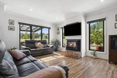 111 Blue Mount Rd Trentham VIC 3458 $1,650,000 Take much desired Blue Mount Road to the edge of the Wombat State Forest, and you will find this light filled, contemporary home loaded with options for its next owner. Set on 4.3 acres of low density residential zoned land mere minutes to the Trentham town centre, this property will provide loads of room for the kids to thrive, offer an opportunity to keep horses or other livestock or perhaps further develop the land holding (subject to STCA). The circular Tuscan stone driveway creates a sense of arrival as you approach this modern recycled brick home, which has been thoughtfully built to enjoy the very best of country living all year round. Enter via the portico double doors to a spacious entry hall, providing glimpses of the forest beyond. A functional floor plan features 3 generous sized bedrooms – the master with ensuite and walk in robe, the further two with BIR's and all featuring quality carpet and stainless steel ceiling fans for comfort. A potential fourth bedroom or work from home office is located at the front of the home. The central bathroom is made for family living and includes a bath, generous shower and heat lamp lighting adjacent to the separate toilet. The busy hub of this home features a gourmet kitchen complete with Smeg and Bosch appliances; and clever use of the large walk in pantry that hides the fridge from view and incorporates plenty of storage. The adjoining dining and living areas are light and bright thanks to large format windows providing green garden views and the vinyl timber floors add contemporary country charm alongside clever use of recycled brick and feature combustion wood heater. This property dials up the entertaining energy with a large rear, covered alfresco area complete with café blinds. Imagine entertaining all your family and friends, with the majestic eucalypts of the forest as your backdrop. There are multiple seating zones, a wall bracket to hook the TV into and a spa! Great memories will be made here. The thoughtful amenity of this property extends to the exterior, with an enormous dam which includes an irrigation pump and taps to water the gardens and livestock, a fully fenced and gated rear garden perfect for keeping kids and pets safe, a large paddock designed for grazing animals – horses, sheep or goats, together with chook enclosure for your feathered friends and complementary shedding for wood or hay. All of this is set amongst low maintenance gardens which include photinia hedging, established maples and native grasses. It is rare to find such a large parcel of land within walking distance to the café culture and retail precinct of Trentham This is the lifestyle property you've been dreaming of - imagine enjoying the solitude and space this property offers without forgoing your first coffee of the day amongst the thriving Trentham community. Trentham is an easy 90 minute drive from Melbourne, located on the Great Dividing Range and only a 15 minute trip to the neighbouring towns of Daylesford, Kyneton and Woodend. Other property features include: - Full double window / door glazing - Ducted evaporative cooling - Reverse cycle split system heating / cooling - Solar boosted gas HWS - High speed fixed wireless connection - Double garage with internal access to the home - Rainwater tanks – 60,000 litres of drinking water