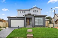 12 Stuart Street Helensburgh NSW 2508 $1,250,000 - $1,320,000 Enjoy the convenience of this brand new, ideally positioned home...Stand alone and offering a luxurious lifestyle of complete convenience and ideal low-maintenance living. This is the one you have been waiting for. A short stroll to shops and cafes with parks with local pool just around the corner. Generously proportioned throughout, this on-trend, brand new residence is an stunning entertainer showcasing soaring ceilings, open-plan living and luxury inclusions with fantastic flow out to the covered alfresco patio and low maintenance yard. Located in a super convenient location, this home offers access to all the popular Helensburgh township has to offer with Northern Illawarra Beaches just a short drive away. Features Include: Stunning gourmet kitchen with stone benchtops, gas cooktop, enormous walk in pantry and ample storage. Light filled open plan living, flows to covered alfresco through glass sliding doors Four bedrooms generous bedrooms, two on each level Spacious master with generous walk-in robe & chic ensuite Fully tiled bathrooms on each level Private yard features a covered alfresco patio and low maintenance gardens Internal laundry, ducted air conditioning throughout and intercom Auto lock-up double garage with internal access, water tank Walking distance to schools, cafes, neighbourhood shops, parks and public transport
