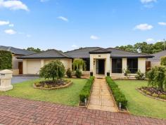 82 Jimmy Watson Drive Woodcroft SA 5162 $730,000 - $780,000 Equal to 9 main rooms, this impressive home proudly sits on a large allotment of approx. 680sqm in a quiet tree studded location. Nestled in the prestigious 'Glenloth' Estate - Woodcroft, this modern family home is sure to impress even the most discerning of buyers. Don't pass up the opportunity to secure this substantial home with nothing to do but move in and enjoy. The current owners have loved and enjoyed all aspects of the home and surrounding community, make no mistake this is a genuine sale that cannot afford to be missed. The modern design features generous living areas and boasts a footprint of approx. 250sqm of both internal and external living, enough 'space' for the entire family. The versatile floor plan makes this home perfect for large or growing families. Boasting 4 generous bedrooms, including the master bedroom with a walk-in-robe, and ensuite bathroom. The remaining bedrooms are all of a good size, have ceiling fans and robes, and are easily serviced by the main family bathroom. The home offers a spacious North facing formal lounge with a picturesque outlook over the landscaped front yard and separate formal dining room / study. Walk through to the casual meals and adjoining family size kitchen. There's also a massive family / living room that offers additional internal living space and leads directly out to the rear entertaining area. Features include quality fixtures and fittings as well as neutral décor and soft furnishings throughout, ducted reverse cycle air-conditioning and solar electrical system. Outside, there is an entertainment area overlooking the rear yard and gardens, providing enough space to entertain comfortably all year round. There is also a patio and 4.7m x 3m powered shed. The allotment provides easily accessible off-street parking and there is a double garage under the main roof. Conveniently located in the heart of 'Glenloth' Estate, close to Woodcroft Plaza and Woodcroft Town Centre shopping precincts, as well as Woodcroft Library and Woodcroft College. Within close proximity to Colonnades Shopping Centre and the Southern Expressway, making the drive to the Adelaide CBD, Flinders Medical Centre and Flinders University a quick and easy one. McLaren Vale, Willunga and the wineries of the Fleurieu are also only a short drive away. Close to Tangari Regional Park, Happy Valley / Reynella East Wetlands and Happy Valley Reservoir Reserve, and the prestigious Vines Golf Club of Reynella. With so much to offer, it's a pleasure to represent 82 Jimmy Watson Drive, Woodcroft for sale and highly recommend an inspection to any buyer serious about securing an impressive family home in this popular location.