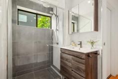 2 / 66 Riverton Street CLAYFIELD QLD 4011 This delightful two-bedroom apartment in one of Brisbane's best suburbs is sure to impress. Situated on the first floor of a well-kept 1970s complex, you'll notice the light and space immediately. There's room to move, relax. With honey-toned wood flooring underfoot, and large windows throughout, the whole apartment feels airy and welcoming. The spacious living and dining area flows to a large, tiled balcony. There's a modern, fitted kitchen with dishwasher, oven and electric cooktop, and lots of storage. The bathroom features a walk-in shower, with monsoon fittings, and attractive cabinetry. Both bedrooms are fully carpeted and feature built-in robes, with extra storage in the hall. The apartment feels cool but for those hot Brisbane summer days, there's air-conditioning in the main living area and fans in both bedrooms. Downstairs, there's secure parking in an extra-large garage, with laundry facilities and internal stairs up to the apartment. The front entrance to the block is also fully secure, with intercom access to each unit. Set on a wide, leafy street, this apartment offers space and style in a superb location just moments from everything. Surrounded by beautiful homes, tree-lined Riverton Street is set right in the heart of one of Brisbane's most established and desirable suburbs. There is excellent access to major schools, shopping centres, and express transport links to the CBD and beyond. It's an easy 400m walk to the buses on Sandgate Road.