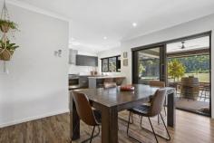 111 Blue Mount Rd Trentham VIC 3458 $1,650,000 Take much desired Blue Mount Road to the edge of the Wombat State Forest, and you will find this light filled, contemporary home loaded with options for its next owner. Set on 4.3 acres of low density residential zoned land mere minutes to the Trentham town centre, this property will provide loads of room for the kids to thrive, offer an opportunity to keep horses or other livestock or perhaps further develop the land holding (subject to STCA). The circular Tuscan stone driveway creates a sense of arrival as you approach this modern recycled brick home, which has been thoughtfully built to enjoy the very best of country living all year round. Enter via the portico double doors to a spacious entry hall, providing glimpses of the forest beyond. A functional floor plan features 3 generous sized bedrooms – the master with ensuite and walk in robe, the further two with BIR's and all featuring quality carpet and stainless steel ceiling fans for comfort. A potential fourth bedroom or work from home office is located at the front of the home. The central bathroom is made for family living and includes a bath, generous shower and heat lamp lighting adjacent to the separate toilet. The busy hub of this home features a gourmet kitchen complete with Smeg and Bosch appliances; and clever use of the large walk in pantry that hides the fridge from view and incorporates plenty of storage. The adjoining dining and living areas are light and bright thanks to large format windows providing green garden views and the vinyl timber floors add contemporary country charm alongside clever use of recycled brick and feature combustion wood heater. This property dials up the entertaining energy with a large rear, covered alfresco area complete with café blinds. Imagine entertaining all your family and friends, with the majestic eucalypts of the forest as your backdrop. There are multiple seating zones, a wall bracket to hook the TV into and a spa! Great memories will be made here. The thoughtful amenity of this property extends to the exterior, with an enormous dam which includes an irrigation pump and taps to water the gardens and livestock, a fully fenced and gated rear garden perfect for keeping kids and pets safe, a large paddock designed for grazing animals – horses, sheep or goats, together with chook enclosure for your feathered friends and complementary shedding for wood or hay. All of this is set amongst low maintenance gardens which include photinia hedging, established maples and native grasses. It is rare to find such a large parcel of land within walking distance to the café culture and retail precinct of Trentham This is the lifestyle property you've been dreaming of - imagine enjoying the solitude and space this property offers without forgoing your first coffee of the day amongst the thriving Trentham community. Trentham is an easy 90 minute drive from Melbourne, located on the Great Dividing Range and only a 15 minute trip to the neighbouring towns of Daylesford, Kyneton and Woodend. Other property features include: - Full double window / door glazing - Ducted evaporative cooling - Reverse cycle split system heating / cooling - Solar boosted gas HWS - High speed fixed wireless connection - Double garage with internal access to the home - Rainwater tanks – 60,000 litres of drinking water