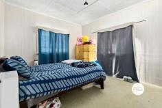 1 / 200 John Street Maryborough QLD 4650 $235,000 What a great way to get into the rental investment market, or perhaps a suitable budget first home or project. Centrally located to the CBD, schools and shops, this very generously proportioned Queenslander has a lot to offer. Featuring two bedrooms plus large sleepout, open plan living comprising defined lounge and dining areas, timber VJ walls and timber fretwork. Separate kitchen with plenty of cupboards, bathroom with shower over bath, toilet is separate and laundry underneath. There is a concrete drive to the single carport outback, plus off-street parking bay out front and loads of space under the house. The property is currently tenanted to March 2023 at $300 per week. While this property is part of a Community Title, there are no body corporate fees, and the driveway is shared only with the property at the rear.