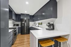 2/112 Lake Avenue Cringila NSW 2502 $679,000 Discover the joys of low-maintenance living with this thoughtfully designed home, which offers a sleek and modern aesthetic you'll surely cherish for years to come. With floorboards throughout, this four-bedroom residence delivers an uplifting sense of light and privacy coupled with spacious proportions that even the most discerning buyer will appreciate. An inviting open plan creates a harmonious relationship between indoor and outdoor living thanks to an alfresco balcony with a delightful leafy outlook and an undercover front porch that'll make a positive first impression. It's conveniently move-in-ready, so the only thing left to decide is how you'd best like to furnish your new home. Features - Living area complemented by alfresco access, A/C - Sleek kitchen with gas cooktop and ample storage - Built in wardrobes in three bedrooms - Under-house storage, level outdoor area - Close to everyday conveniences including parks and public transportation
