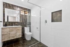 2/112 Lake Avenue Cringila NSW 2502 $679,000 Discover the joys of low-maintenance living with this thoughtfully designed home, which offers a sleek and modern aesthetic you'll surely cherish for years to come. With floorboards throughout, this four-bedroom residence delivers an uplifting sense of light and privacy coupled with spacious proportions that even the most discerning buyer will appreciate. An inviting open plan creates a harmonious relationship between indoor and outdoor living thanks to an alfresco balcony with a delightful leafy outlook and an undercover front porch that'll make a positive first impression. It's conveniently move-in-ready, so the only thing left to decide is how you'd best like to furnish your new home. Features - Living area complemented by alfresco access, A/C - Sleek kitchen with gas cooktop and ample storage - Built in wardrobes in three bedrooms - Under-house storage, level outdoor area - Close to everyday conveniences including parks and public transportation