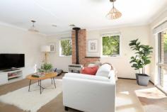 28 Romaine Street Blackheath NSW 2785 $820,000 - $870,000 Boasting a delightfully picturesque outlook across the established garden, ample natural light and recently refurbished interiors, this property presents an amiable charm to all who visit. Bright, with a versatile layout, separate living area/s, timber flooring, private setting and sought after laneway location, this home offers the perfect opportunity to buyers looking to make the move into the area. FEATURES BREAKDOWN; Privately situated down tree-lined driveway Generous 935m2 approx block Central lounge space with ambient slow combustion fireplace Versatile space for a second living room, third bedroom or self-contained retreat Modern kitchen with stone bench tops, SMEG six burner stove and Miele dishwasher Two bedrooms with built-in-robes Glamorous 1930's inspired bathroom Central gas heating Timber flooring and ample natural light creates a warm and inviting atmosphere Spacious modern laundry with barn style door, storage and additional toilet Outdoor covered entertaining area as well as an indoor sunroom Well established garden offering a picturesque outlook from most rooms of the house Conveniently located within walking distance to village (1.9kms approx) and national park Friendly and inviting, this charming home is ready for you to move in, sit back and relax while overlooking the leafy garden from your indoor/outdoor sunroom.