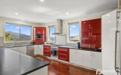1/83 Ripley Road West Moonah TAS 7009 $835,000 Nestled towards the end of a quiet cul-de-sac sits this elegant and exclusive residence. This brick veneer family home of grand proportions is extremely modern, and clearly designed for relaxed living. Sure to attract those with a discerning eye and a taste for class, you will enjoy the sheer pleasures this property has to offer. From the beautifully appointed kitchen, leafy views from the entertaining deck and the flexibility of a unique floorplan you will not be disappointed. Boasting 280sqm (approx.) of living there is ample room for everyone and although listed as a townhouse is as big, or larger than most houses in the area. Upon entering you are greeted into a foyer with stairs which lead you up to the vast living room with polished flooring and bay windows. The exquisite kitchen is full of many features including, walk in pantry with auto lighting and quality stainless steel appliances. Via the dining, there are glass sliding doors which open out to a steel framed undercover hardwood deck, the most perfect spot for entertaining no matter what the time of the year. The lounge is separated from the other living areas and the whole area upstairs here is sufficiently heated and cooled by two Daikin heat pumps and gas log fire. The main bedroom has the convenience of a spacious walk-in robe and ensuite with fully programmable under floor heating, while the other two upstairs bedrooms are both a good size and have built ins. The main bathroom also has under floor heating and the luxury of a two-person spa bath. Heading downstairs there is the convenience of a fourth bedroom with two-way access to the third bathroom. The area here is a great space for a teenagers retreat or a guest wing with its privacy away from the main rooms in the home. Here there is also internal access to the huge double garage which provides ample space for a workshop and storage. The backyard has been terraced, fenced, and landscaped into two areas, allowing children and pets to play separately. The bottom section has gate access to allow for parking of a boat or trailer. This is a beautiful home that is an absolute pleasure to inspect and an absolute privilege to show. Low maintenance and luxurious. It is certain to please a range of prospective buyers and will rival any other prestige home available for sale in the area.