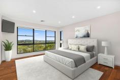 13 Plumwood Crescent Cordeaux Heights NSW 2526 Positioned within a coveted cul-de-sac, this north-west facing home will impress and inspire in equal measure. Boasting panoramic escarpment views and ocean glimpses, this idyllic residence spanning over three spacious levels is ready to welcome a new family to make memories within its four walls. You truly need to see this property to appreciate its full potential with an endless list of features that include; four well-proportioned bedrooms, a main with an oversized ensuite and walk-in-robe, a double garage with internal access, ducted air-conditioning, a sun-drenched backyard and multiple living and dining areas including a rumpus room that opens onto an all seasons alfresco area. Features - Four well proportioned bedrooms with built in robes, main with walk in robe + ensuite - Oversized kitchen with granite bench tops, gas cooktop and glass splash back - Double garage with internal access, attic storage, ducted vacuuming, security alarm system - Rumpus room with bar provision, an abundance of storage solutions - Everyday conveniences including cafes, shopping, schools and playgrounds are all within easy distance