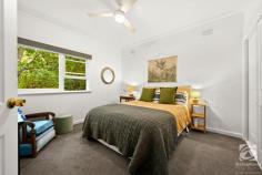  8 Finch Street Beechworth VIC 3747 $890,000 - $910,000 The location of this renovated 60's style cottage, in the beautiful tree-lined Finch Street, is unbeatable! Offering peace and quiet and yet being right in town, this house is perfect for down sizers or retirees. Projecting an exclusive sense of privacy with the simple lines of this 1960s design blending into a leafy streetscape, this three-bedroom renovated home delights in the quietness of its central position yet Ford and Camp Street shops, cafes and art spaces are in ambling proximity. The front porch makes the perfect place to sit and relax and invites you into this heartwarming home. Reflecting the era's style, the relaxed lounge domain incorporates space for all. The dining area is bathed in natural light and can be easily enjoyed with family and friends. The well-appointed modern kitchen accommodates daily mealtimes with ease. A covered deck at the rear provides a tranquil alfresco escape. The home hosts three comfortable freshly carpeted and robed bedrooms, a large spa bathroom and a separate WC, whilst a fantastic laundry and a brand new 6.0m x 5.5m vehicle accommodation and workshop will add to the overall allure. All set within a colourful, easy-to-maintain 789 sq m allotment in fabulous Finch Street. The whole home has been recently recladded with modern linea weatherboards and has been professionally painted extensively. Heating and cooling options include a gas log, reverse cycle air conditioning and ceiling fans. It's only when you get to inspect 8 Finch Street you will gain a sense of the peace and quiet such a central Beechworth location can provide. A treechange like no other. 