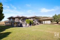 4902 Kiewa Valley Highway Dederang VIC 3691 $680,000 - $740,000 Situated on approximately 20 acres is this character-filled four-bedroom, three-bathroom home. Built in 1950, the home exudes character and unique design. The property includes three living areas and plenty of versatile spaces to cater for the whole family. With views towards the snowfields, and only a 35-minute drive from Wodonga and 25 minutes to Kiewa, the property is perfectly positioned to take full advantage of a rural lifestyle, but still close to all needed amenities. The unique architectural design of the house is an absolute standout. With hints of Art Deco elements on the exterior and a charming country house feel inside, the home is a one-of-a-kind find. The spacious open-plan living area with floor-to-ceiling glass windows allows natural light to flood in, creating a warm and inviting atmosphere. You'll love the sense of space and style that this home provides, which is perfect for entertaining and relaxing all year round. This house is not only beautiful but extremely functional. The upstairs section of the home has the master bedroom with ensuite and split system, and two additional bedrooms on the top floor. A formal living area also looks out to the magnificent hillside views and leads to the open-plan kitchen and dining space. The kitchen features a stainless-steel dishwasher, gas stove top and oven. The dining area looks out to the amazing views of the hills, and the balcony area is perfect for family gatherings, quiet reading or enjoying the peaceful surroundings. Head down the stairs and you will find a bedroom, another living or rumpus room, and a powder room with a shower. There is also a large under-house storage section that could be used as a wine cellar or cool room. Additional features include: -A 10x12m powered shed, and 4x12m shed -Chook pen -245,000 litre tank -Cattle yards Whether you're dreaming of your hobby farm or simply wanting to escape the hustle and bustle of city living, this property ticks all the boxes. Don't miss out on the rare opportunity of owning such a unique and stunning property in the heart of the Kiewa Valley.