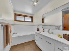 63 Ready St Rutherglen VIC 3685 $475,000 This well built and fastidiously maintained, (4) four bedroom family home, sitting on a fully fenced 1107m2 block is an amazing opportunity for the first home buyer or investor alike. Area 1107m2 (Approx.) Location Situated in the historic wine-growing town of Rutherglen in North-East Victoria, 10 minutes from the Murray River, 46 km from Albury and 42km from Wangaratta. Residence This home with its big windows, central under floor heating, ceiling fans, evaporative cooling and split system air conditioning is a very pleasant and comfortable place to spend time. At the centre of the home is a wonderful retro kitchen, with breakfast bar, dining area, lounge and sliding glass door out onto the covered alfresco area. To the front of the home is a second large living area with wall-to-wall carpet and views to the street. There are (4) four bedrooms, (3) three with built in robes, all with large windows for natural light and to catch a summer breeze. The bedrooms are serviced by a freshly renovated (2) two-way family bathroom. Garden & Surrounds Outside the yard is neat and tidy with beautiful established garden, green lawns, raised vegetable garden beds and citrus trees. Shedding Featuring a fantastic 5.4m x 7.6m lock up garage/workshop with concrete floor and power. Single carport off the side of the house. Even under cover shelter for the tinny. Access to garage/workshop down the side of house.