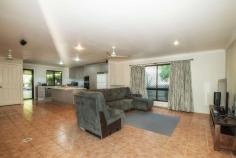 3 Ebony Way Biloela QLD 4715 $450,000 If size and location are high on your priority list, then this property in a sought after and popular family friendly neighbourhood, should be at the very top of your "inspect today" list. This low set home with a stylish façade is family sized living from front to back. The open plan, living and dining area provides access to the enormous undercover, alfresco area which is bound to become an entertainer's delight. A quiet, private and weather proof retreat to be enjoyed by all. A near new kitchen is positioned so that all living areas are within view. There's an island bench and the sheer functionality of ample storage. A pleasing colour pallet completes the look. There's a separate space adjoining the living room which would lend itself perfectly to a craft room or even a separate sitting room. The property boasts 4 above average sized bedrooms situated away from the main living area. All have fans, air-conditioning and built-in robes. The master bedroom of course, with ensuite and walk-in robe. Side by side car spaces in a lockable garage with drive through access to the back yard and the 6m x 6m* powered shed. For anyone who fancies themselves as a bit of a musician, there's even a built-in, sound-proof music room to keep you entertained and your neighbours happy.