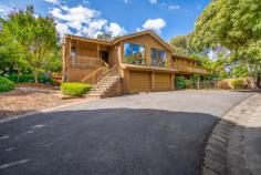 Unit 5/18 Jaeger Cct Timber Top Bruce ACT 2617 Situated at the high end of a private road, this wonderful home is superbly positioned in the exclusive Timbertop development on Jaeger Circuit in old Bruce. Backing onto the bushland environment of Gossan Hill Nature Reserve, this home provides a rare opportunity for a lifestyle surrounded by nature that is only minutes from the Heart of Belconnen, Canberra University, The AIS, Civic Town Centre, Calvary hospital and a choice of highly sort-after schools. This splendid home features a split level design with raked ceilings and large light filled rooms. A spacious residence boasting 3 to 4 bedrooms, including a fully self contained studio apartment on the lower level. Upon entering you will be welcomed by a large lounge area featuring a stylish fireplace as its focal point. Stunning garden and bush views from the living room also add to the unique and secluded ambiance of this special home. A large modern kitchen, with high quality appliances and ample storage space, adjoins the living area where an extensive family room leads to the private rear yard, boasting a large indoor/outdoor room perfect for relaxing surrounded by the beautiful garden and bush landscape. A sparkling inground pool awaits you with the added bonus of a covered pool cabana area, perfect for entertaining with family and friends. The substantial master bedroom includes a walk-through robe and spacious ensuite. The second upstairs bedroom is large with built-in wardrobes. A main bathroom, with separate toilet, offers convenience as does the hideaway laundry tucked away close to the kitchen. The self contained apartment is located on the lower level. With internal access, it could be used as an excellent ‘in-laws’ accommodation, a teenage retreat or a separate flat, as it also has private access from the front garden. The apartment has a kingsize bedroom, with large wardrobes and storage. It also includes a modern ensuite and kitchenette with a dining nook and a lounge area. Ample off street parking is a great feature of this property in addition to the large double lock up garage, with plenty of workbench and shelf storage space. There is also extensive under house storage options, including a large secondary laundry/storage room.