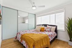 2/112 Lake Avenue Cringila NSW 2502 $679,000 Discover the joys of low-maintenance living with this thoughtfully designed home, which offers a sleek and modern aesthetic you'll surely cherish for years to come. With floorboards throughout, this four-bedroom residence delivers an uplifting sense of light and privacy coupled with spacious proportions that even the most discerning buyer will appreciate. An inviting open plan creates a harmonious relationship between indoor and outdoor living thanks to an alfresco balcony with a delightful leafy outlook and an undercover front porch that'll make a positive first impression. It's conveniently move-in-ready, so the only thing left to decide is how you'd best like to furnish your new home. Features - Living area complemented by alfresco access, A/C - Sleek kitchen with gas cooktop and ample storage - Built in wardrobes in three bedrooms - Under-house storage, level outdoor area - Close to everyday conveniences including parks and public transportation