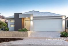 28 Elsbury Access Clarkson WA 6030 $549,000 Come home to elegance and style with this stunning home located in the heart of Clarkson. This beautiful property is the perfect blend of functionality and comfort, designed to provide an excellent living experience for you and your family. Conveniently located close to shopping centres, great schools and the pristine Perth coastline, a vibrant lifestyle awaits! An impressive facade with sleek lines and a front garden welcomes you to the residence. The entrance gallery is framed by high ceilings and solid timber flooring which create a warm first impression. Upon entry, a study provides the ideal place for a work-from-home setup or potential as a fourth bedroom. The spacious master suite is complete with a modern ensuite as well as his and hers walk-in robes which deliver the perfect setting to unwind after a long day. Two well-sized secondary bedrooms and a theatre ensure ample space for all residents. The home's focal point is the spacious open-plan kitchen, living and dining area. This light-filled area is an ideal setting for family togetherness. The gourmet kitchen is complete with stone benchtops and generous cabinetry which provide an excellent space for culinary inspiration. Outdoors, you'll find a low-maintenance backyard, perfect for entertaining guests or relaxing with your family. The alfresco area is perfect for summer barbecues and enjoying the West Australian lifestyle. Don't hesitate, this one will not last long! Contact Michael Keil today to register your interest! Property Features: ● Attractive contemporary facade ● Solid timber flooring ● Study ● Plantation shutters ● Clean carpets ● High ceilings ● Large master suite with walk-in his and her robes and modern ensuite with double vanities and an oversized shower ● Two well-sized secondary bedrooms with built-in robes with mirrored sliders ● Primary bathroom with vanity, shower and separate wc ● Spacious theatre ● Expansive open-plan kitchen living and dining area ● Gourmet kitchen with stone benchtop, under-mount sink and generous cabinetry ● Paved alfresco ● Backyard area with astroturf ● Double car garage ● Block Size:390 sqm ● Water Rates: $1,130.07 pa ● Council Rates: $2,050 pa Location Features: ● Short drive to the WA coastline ● Close to Somerly Primary School and St Andrew's Catholic Primary School ● Short distance to shopping centres