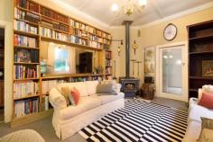 17-19 Panorama Rd Bundanoon NSW 2578 $1,950,000 - $2,145,000 Historic circa 1900s sandstone cottage set amongst a stunning Edna Walling designed garden offering old world charm and scope for so much more. Enter via the privately screened gate over the engineered bridge and through the gorgeous grounds before finding yourself at the cosy two bedroom residence, the ultimate weekend hideaway, holiday rental or forever home. Cottage is mostly in original condition offering two bedrooms and a generous well proportioned bathroom and separate laundry / mudroom, a very usable space; Open plan living / dining flows to both the front stone terrace with centrally placed water feature and the side screened verandah perfect for hot summer nights, and flows seamlessly to the large kitchen with Aga, in need of some renovation plus additional access to the rear verandah; Heating is via the s/c wood fire with modern conveniences blending with charming finishes such as all town services, timber casement windows, French doors, high ceilings and constructed from Bundanoon Sandstone, all adding to the uniqueness of this cottage; With subdivision potential a real possibility (STCA) and / or space at the rear of the property for a second dwelling if desired, this elevated sweeping lawn area offers distant local views and privacy from the original residence; Breathtaking gardens wrap this home in privacy with dappled sunlight warming the home and verandahs. Offering a series of garden rooms, inclusive of European and Australian species, rainforest oasis and heritage orchard, a great place for children and adults alike to explore. Minutes to the village and all Bundanoon has to offer, in a blue ribbon street ‘Estoril’ will capture your heart.