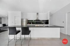 9 Agave Grove Coffs Harbour NSW 2450 $740,000 - $760,000 9 Agave Grove, Coffs Harbour is a stunning family home that offers ample space at an affordable price. Boasting a contemporary design, this property is perfect for families, down sizers and investors. The property features three large bedrooms, providing plenty of space for everyone in the family. Additionally, there are two bathrooms, ensuring that there's no need to queue for the bathroom during busy mornings. The spacious 2-car garage offers plenty of room for vehicles and storage, providing the perfect place to park your car and store all of your family's possessions. The contemporary design boasts sleek finishes and is filled with natural light, creating a bright and welcoming space. The property also features three air conditioners, ensuring that you can enjoy comfortable living throughout the year, no matter the weather outside. The open-plan living and dining area provides a versatile space for both relaxing and entertaining, making it the perfect hub for family life. The kitchen is modern and well-equipped, with lots of bench space and extra large walk in pantry, making cooking a breeze. This property truly is a private oasis, offering modern comforts and a spacious layout that's perfect for families. Located in a highly sought-after area of Coffs Harbour, the property is within easy reach of schools, cafes, shops, and transport links.