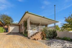 2 / 7 Kirk Avenue Tumut NSW 2720 $369,000 Offered to the market for the first time in almost nine years is this conveniently located and extremely low maintenance two-bedroom unit, positioned in a quiet cul-de-sac and comprising of just three units within the complex. You will love the simplicity, convenience and privacy of this well-maintained unit in the heart of town. Do not miss your opportunity to secure this two-bedroom unit, call today to book your private inspection! Premiere Features: - Two great sized bedrooms positioned to the rear of the plan and boasting built in robes and ceiling fans - Light filtered bathroom with separate bath, separate shower and single vanity - Great sized kitchen with ample bench space, storage options and electric cooktop - Open plan living and dining serviced by split system air conditioning and positioned to take in the elevated aspect, including direct access to the front deck - Separate toilet - Internal laundry with direct external side access - Great sized front deck with an elevated aspect perfect for outdoor entertaining - Very low maintenance rear courtyard with garden shed and clothesline - Single lock up garage with direct private access to the rear courtyard - Guest parking available off street - Cul-de-sac positioning in a small complex of just three units - Walking distance to Tumut retail precinct - Long term tenancy currently tenanted at $250 per week