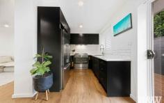 94 Priestman Ave Umina Beach NSW 2257 $1,100,000 - $1,175,000 After undergoing a major transformation, this immaculate single level home oozes quality and style. Well positioned in a quiet no thru street & only 1.5km to Umina Beach town centre & beaches. - Three bedrooms, built in robes in the main and second bedroom & all with ceiling fans - Stunning kitchen with 40mm stone benchtops, 900mm freestanding electric oven with gas cooktop & modern cabinetry - Spacious bathroom with a free standing bath, wall hung vanity, frameless shower screen and floor to ceiling tiling - Living & dining area with reverse cycle air-conditioning, recessed entertainment unit & floating flooring - Plantation shutters throughout - Internal fitted out laundry with external access - Large decking area at the side of the home leading to covered entertaining at the rear - Beautifully landscaped gardens & lawns with popup sprinkler irrigation system - Great privacy on a fully fenced block - Oversized singe garage for great storage - Other features include a private spa area, natural gas outlet in entertaining area for heating or cooking, instant natural gas hot water, LED downlighting throughout and square set cornices.